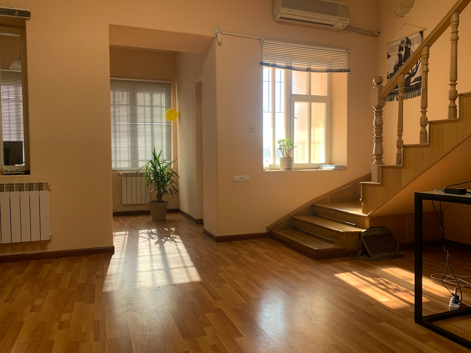 brown wooden parquet floor near white wooden door